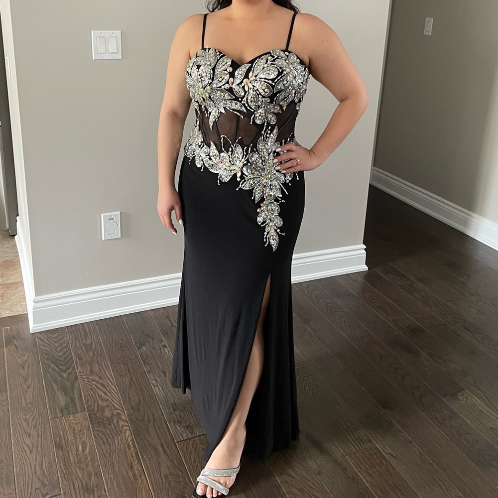 Gorgeous floor length black prom dress with beading detail and side split